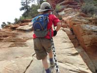 37-Kenny_climbing_up_using_the_chains
