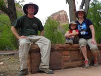 68-family_at_bus_stop_with_Angels_Landing_in_background