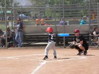 21-game_2-Kenny's_at_bat_taking_a_swing-Daddy's_third_base_coach