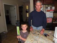 11-Kenny_holding_Poppy's_birthday_gift-hiking_sticks