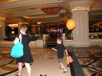 11-Kenny_got_a_balloon-walking_through_the_casino_to_go_back_home