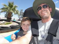 36-bigger_go-carts-Daddy_driving-able_to_get_picture-no_video-Kenny_didn't_want_to_ride_again