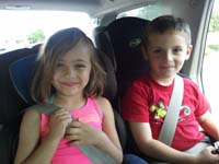 51-Zoe_and_Kenny-sitting_together_for_a_ride_to_a_party