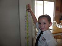 76-we_now_have_to_use_the_measuring_tape_for_Kenny's_height