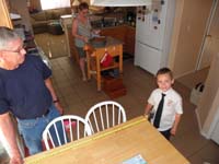 79-now_that_he's_discovered_tape_measure,he_measures_things_to_discover_he_is_taller_than_kitchen_table_is_long