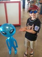 15-Baba_bought_Kenny_a_little_blue_alien_at_the_game