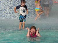 31-Kenny_ready_to_jump_over_Mommy-first_splash_water_on_Mommy