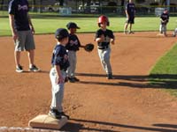 13-Kenny_running_to_third_base