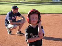20-Kenny_on_third_base_showing_his_boo-boo-ouch