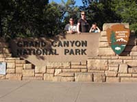 01-family_at_Grand_Canyon_National_Park_entrance_sign