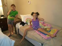 04-Sierra_calling_her_parents_telling_them_she's_having_fun-got_her_own_bed