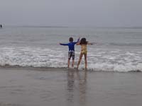 05-Kenny_and_Sierra_jumping_over_waves