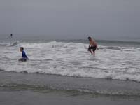 06-Kenny_and_Daddy_jumping_over_waves
