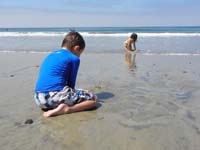 30-Sierra_and_Kenny_having_fun_in_the_ocean