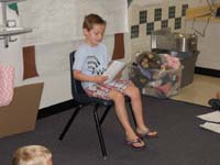 13-Kenny_presenting_his_story_about_Baby_Giraffe