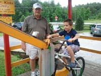 06-peddling_food_to_the_goats_on_the_roof