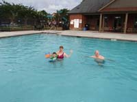 16-Kenny,Mommy,Grandpa_Duke_having_fun_in_the_pool