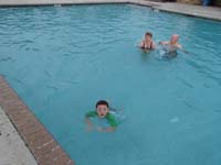 17-Kenny,Mommy,Grandpa_Duke_having_fun_in_the_pool