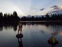 15-Kenny_gives_thumbs_up-pretty_clouds_at_Manzanita_Lake_at_sunset