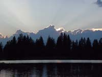 16-neat_effect_of_setting_sun_on_clouds_at_Manzanita_Lake_at_sunset