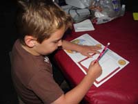 22-since_rested,he_needs_to_work_on_Junior_Ranger_program_before_actually_going_to_bed