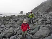 38-Mommy_and_Kenny_hiking_back_along_the_rocks_carefully-slippery_in_many_spots-even_Daddy_slipped
