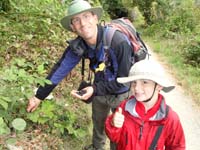 45-Daddy_and_Kenny_picked_a_lot_of_wild_blackberries_on_the_trail_back