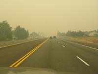 01-very_bad_forest_fire_smoke-quarter_mile_visibility-Daddy_on_phone_with_Poppy-Daddy's_car_is_leaking_gas