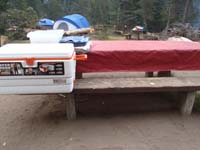 05-Kenny's_picture-cooking_and_eating_table-he_took_a_number_of_random_meaningful_pictures_to_him,not_us