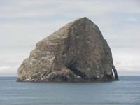 33-neat_rock_pinnacle_jutting_out_of_water