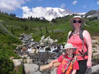29-Mommy_and_Kenny_with_very_pretty_scenery_with_Mount_Rainer_and_water