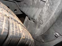 06-wheel_well_pushed_closer_to_the_tire_and_bracket_broke