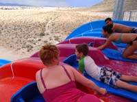 05-Mommy_and_Kenny_ready_to_go_down_Desert_Racers_slide