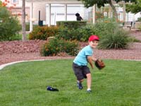11-he's_happy_he_threw_a_good_ball_to_Daddy
