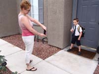 11-Mommy_taking_pictures_of_Kenny
