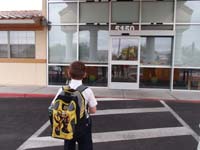 16-Kenny_entering_the_school-we_were_supposed_to_use_car_line,but_instead_walked_in