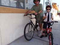 33-Daddy_and_Kenny_are_doing_to_ride_bikes_from_school_to_home