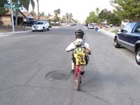 34-likes_riding_bike_home-Daddy_had_to_walk_fast_carrying_his_bike-drive_to_school_in_morning_next_time
