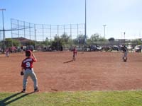 32-playing_right_center_field-Daddy_is_a_defensive_coach