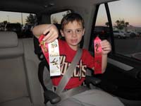 11-Kenny_shows_off_his_ribbons_from_the_race