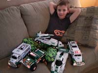 52-Kenny_and_his_Hess_trucks_he_still_likes_to_play_with