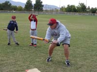 20-angling_the_bat_to_bunt_and_send_the_ball_down_first_base_line