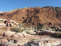 02-Kenny_taking_a_rest_on_sandstone_before_going_up_steep_limestone