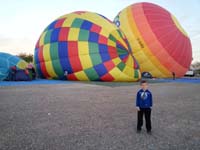 05-Kenny_enjoys_watching_the_balloons_fill_with_air