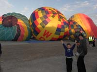 07-Kenny_and_Mommy_with_balloons_filling_with_air