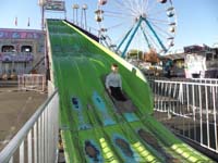 24-and_the_slide-he_spent_a_few_time_in_mirrored_house_to_left