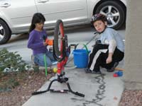 02-Kenny,Tara,and_Sarena_playing_in_front_yard