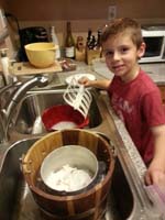 07-Kenny_helping_Mommy_create_homemade_ice_cream_for_Daddy's_birthday_gift