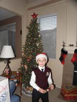 28-Kenny_is_having_lots_of_fun_decorating_the_Christmas_tree