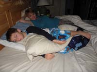 34-Kenny_falls_asleep_often_in_our_bed-he_likes_cuddling_with_Daddy's_pillow_for_some_reason
